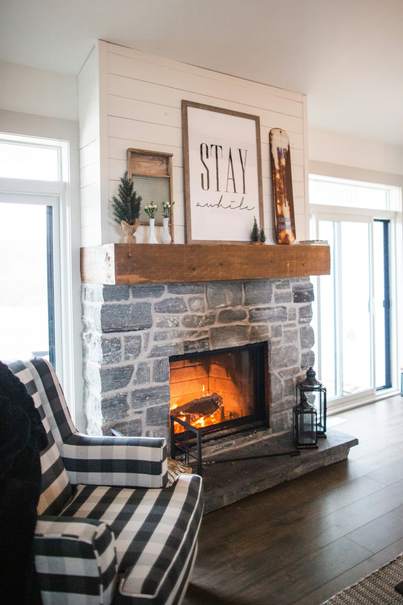 Cozy stone fireplace in a farmhouse living room